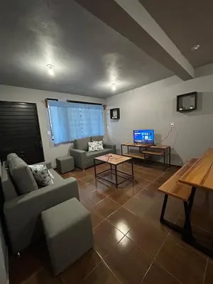 Una televisión o centro de entretenimiento en Villas de Bravo