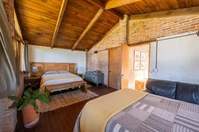 Cama o camas de una habitación en Oyameles Centro de Experiencias