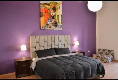 Cama o camas de una habitación en Le Chat Noir