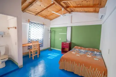 Cama o camas de una habitación en Mahue Rooms and Camping