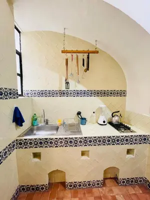 Una cocina o zona de cocina en Departamento en casona del siglo XVI frente al Zócalo de Puebla #6