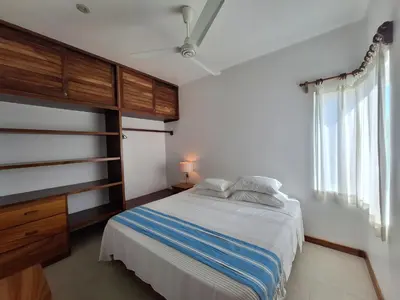 Cama o camas de una habitación en Tortugas dos cero uno