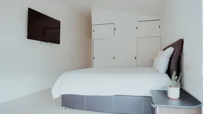 Cama o camas de una habitación en Hotel San Felipe