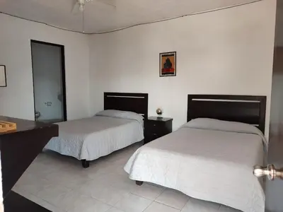 Cama o camas de una habitación en Hotel Villas Cuernavaca