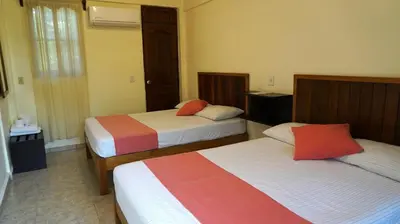 Cama o camas de una habitación en Bacanda Hotel
