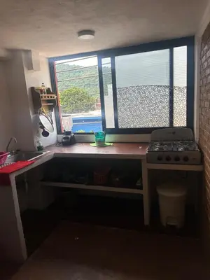 Una cocina o zona de cocina en Beatiful aparment in the magical town of Orizaba 2