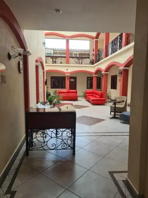 Zona de estar de Hotel Las Violetas