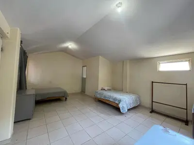 Cama o camas de una habitación en Hotel Aguila Real