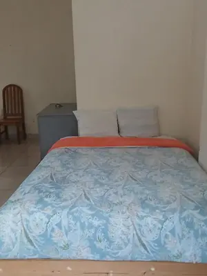 Cama o camas de una habitación en Hotel Aguila Real