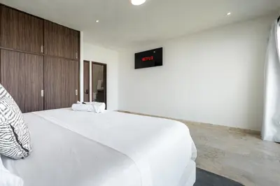 Cama o camas de una habitación en Villas Acapulco Punta Diamante