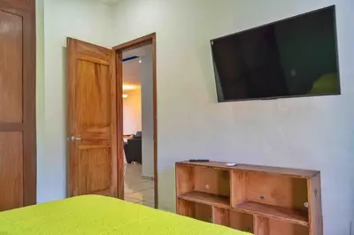 Una televisión o centro de entretenimiento en Casa Lucero de Mar