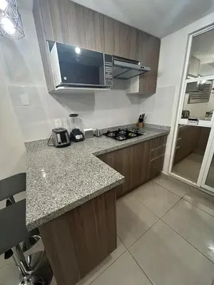 Una cocina o zona de cocina en Club de Playa, Alberca y Amenidades - Departamento E4