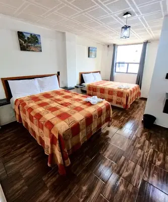 Cama o camas de una habitación en Palacio de los Angeles