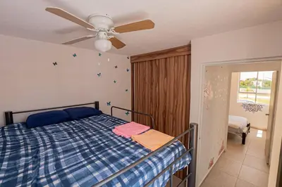 Cama o camas de una habitación en Family House with Water Park Tlayecac, 3 Bedrooms