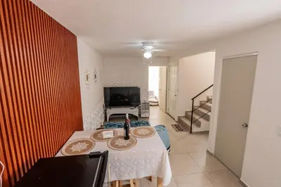 Una televisión o centro de entretenimiento en Family House with Water Park Tlayecac, 3 Bedrooms