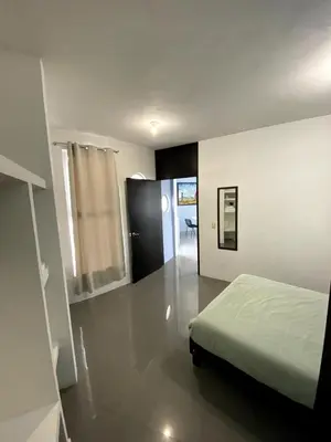 Cama o camas de una habitación en Departamento Gudelia