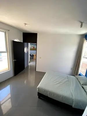 Cama o camas de una habitación en Departamento Gudelia