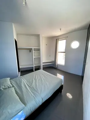 Cama o camas de una habitación en Departamento Gudelia