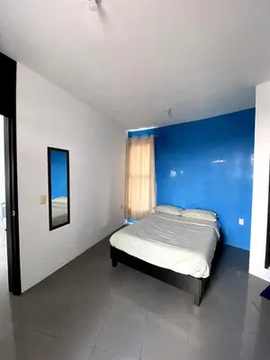 Cama o camas de una habitación en Departamento Gudelia