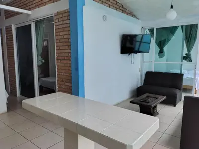 Una televisión o centro de entretenimiento en Casa DGallardo Costa esmeralda