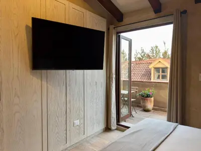 Una televisión o centro de entretenimiento en Mar en ValQuirico