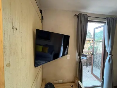 Una televisión o centro de entretenimiento en Fiore Master en ValQuirico