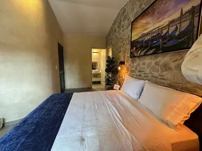 Cama o camas de una habitación en Venezia 3 en ValQuirico