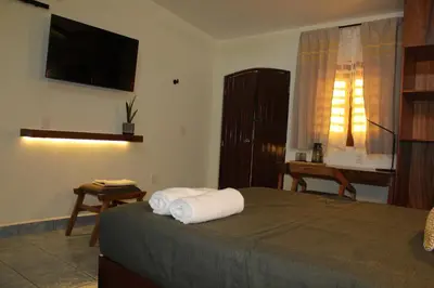 Cama o camas de una habitación en Casa de Alicia - Habitación Xaguar