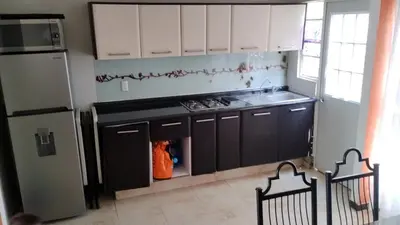 Una cocina o zona de cocina en Tranquility, Sun and Nature
