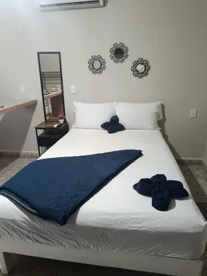 Cama o camas de una habitación en Suite 105 Cordoba centro y estacionamiento