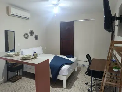 Cama o camas de una habitación en Suite 105 Cordoba centro y estacionamiento