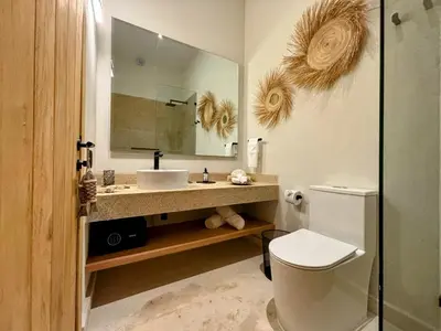 Un baño de ÚNICO LA PUNTA HOTEL BOUTIQUE Beach club