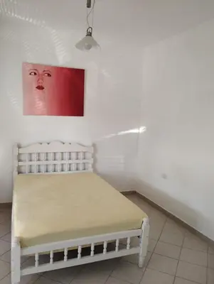 Cama o camas de una habitación en Recámara amueblada en casa