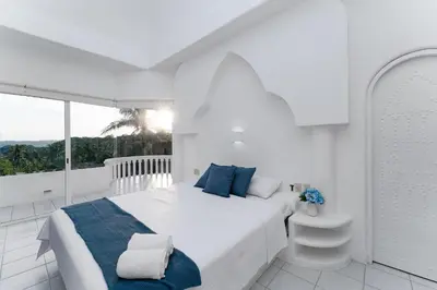 Cama o camas de una habitación en 3067 - Casa Blanca