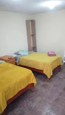 Cama o camas de una habitación en Departamento C-3