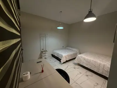 Cama o camas de una habitación en Villa los Encinos