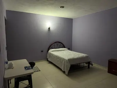 Cama o camas de una habitación en Villa los Encinos