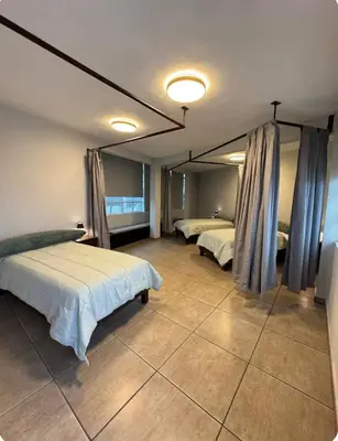 Cama o camas de una habitación en Habitación unos pasos de estadio GNP foro sol
