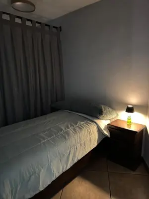 Cama o camas de una habitación en Habitación unos pasos de estadio GNP foro sol