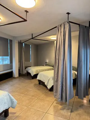 Cama o camas de una habitación en Habitación unos pasos de estadio GNP foro sol