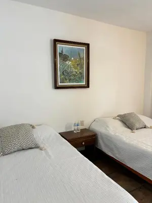 Cama o camas de una habitación en Hotel del Pueblo