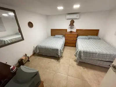 Cama o camas de una habitación en Penthouse Acapulco diamante