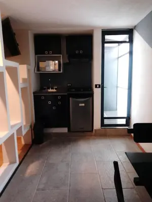 Una cocina o zona de cocina en Hotel Business