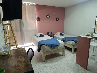 Cama o camas de una habitación en Habitación 102 Cordoba Centro Estacionamiento