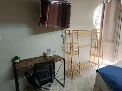 Cama o camas de una habitación en Habitación 102 Cordoba Centro Estacionamiento