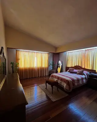 Cama o camas de una habitación en Casa Carmesí