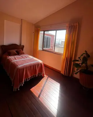 Cama o camas de una habitación en Casa Carmesí