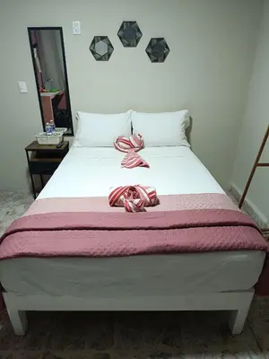 Cama o camas de una habitación en Suite 103 Cordoba Centro con Estacionamiento
