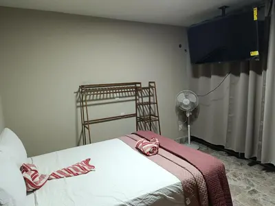 Cama o camas de una habitación en Suite 103 Cordoba Centro con Estacionamiento