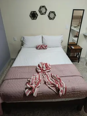 Cama o camas de una habitación en Suite 104 Cordoba Centro Estacionamiento